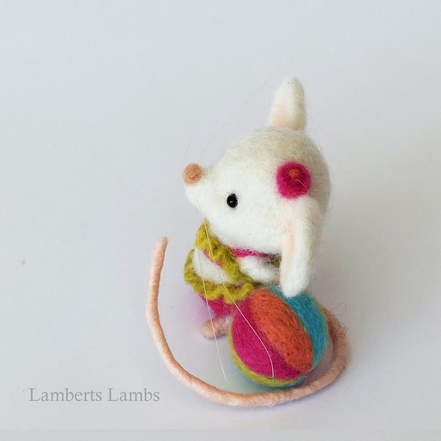 White needle felted mouse in a two piece swimsuit with a beach ball. Beach collection . Summer felted mouse.