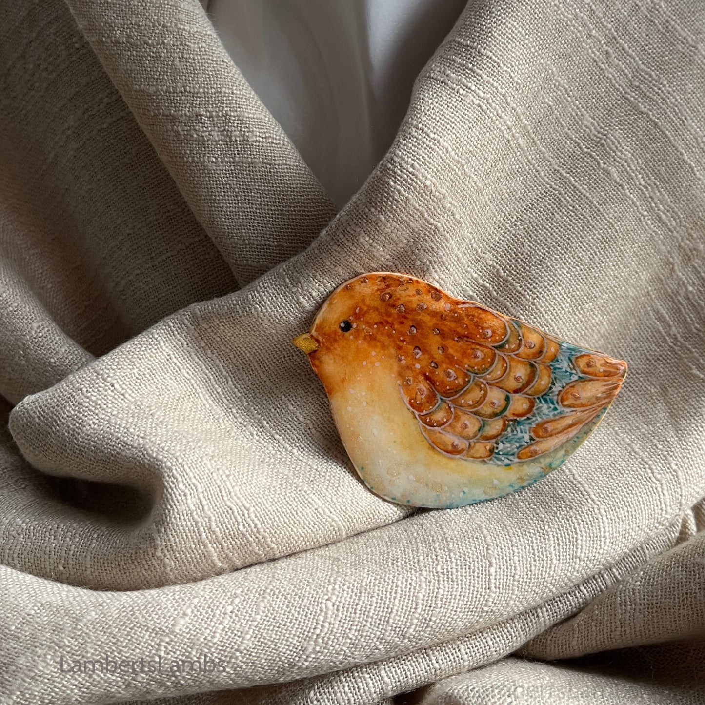 Hand painted bird brooch in shades of brown
