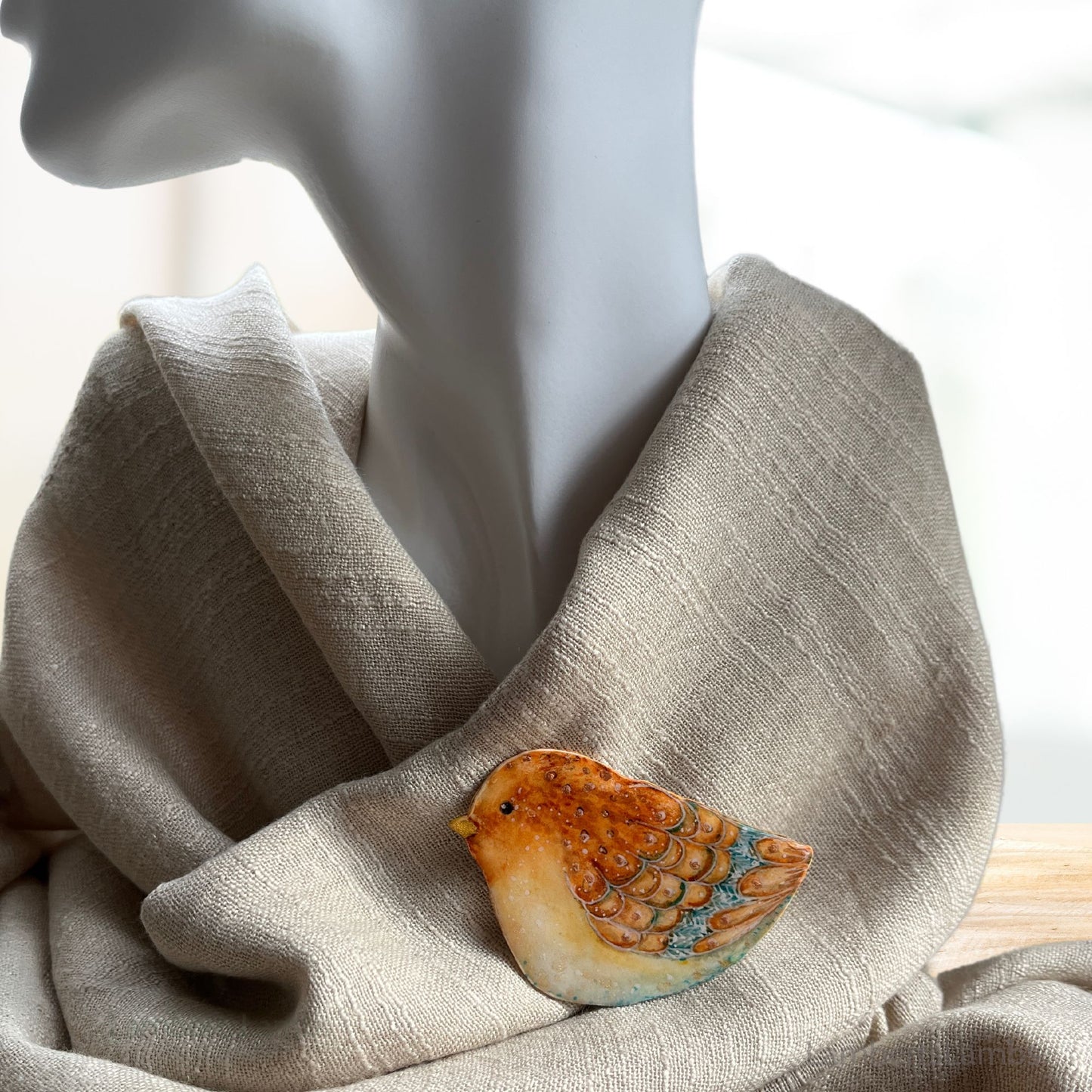 Hand painted bird brooch in shades of brown