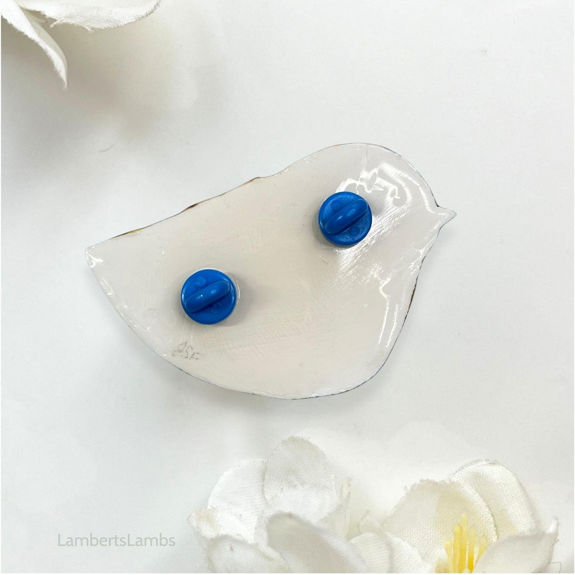 Hand painted bird brooch in blue pink and gold