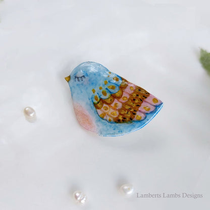 Artsy hand painted light blue, pink and gold bird brooch