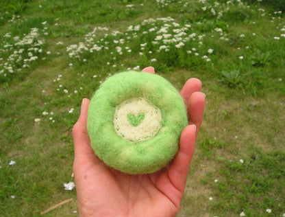 Needle felted pin cushion of sheep in the meadow