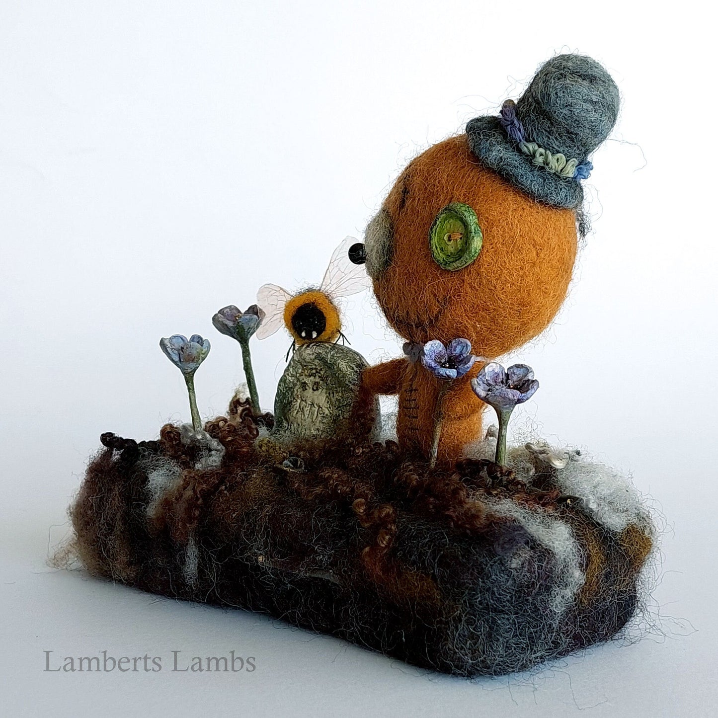 Gingerbread man voodoo doll in a graveyard diorama