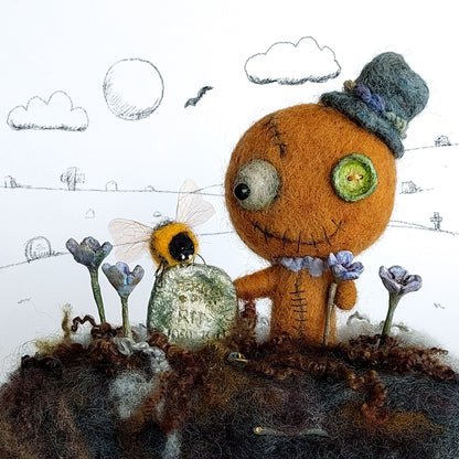 Gingerbread man voodoo doll in a graveyard diorama