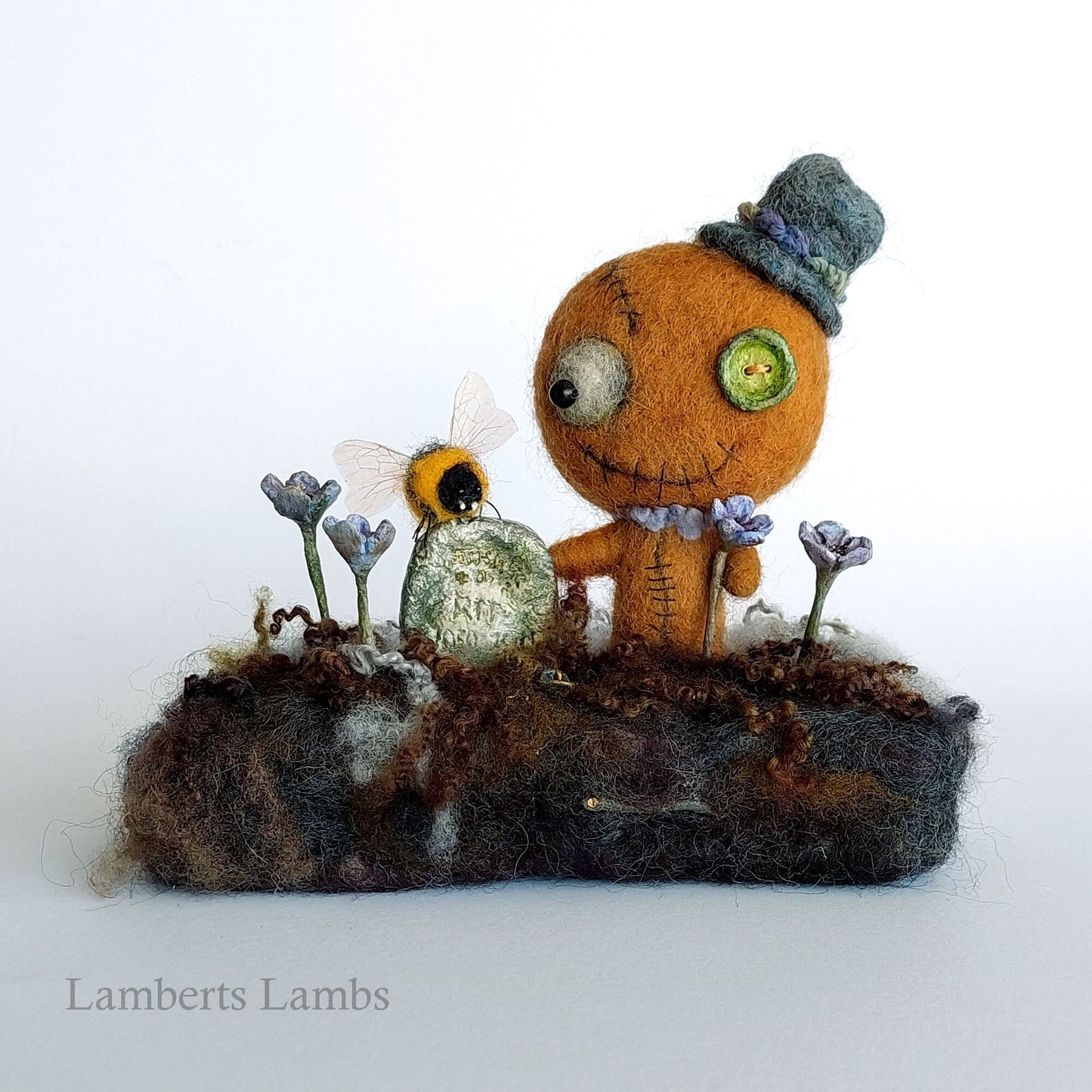 Gingerbread man voodoo doll in a graveyard diorama