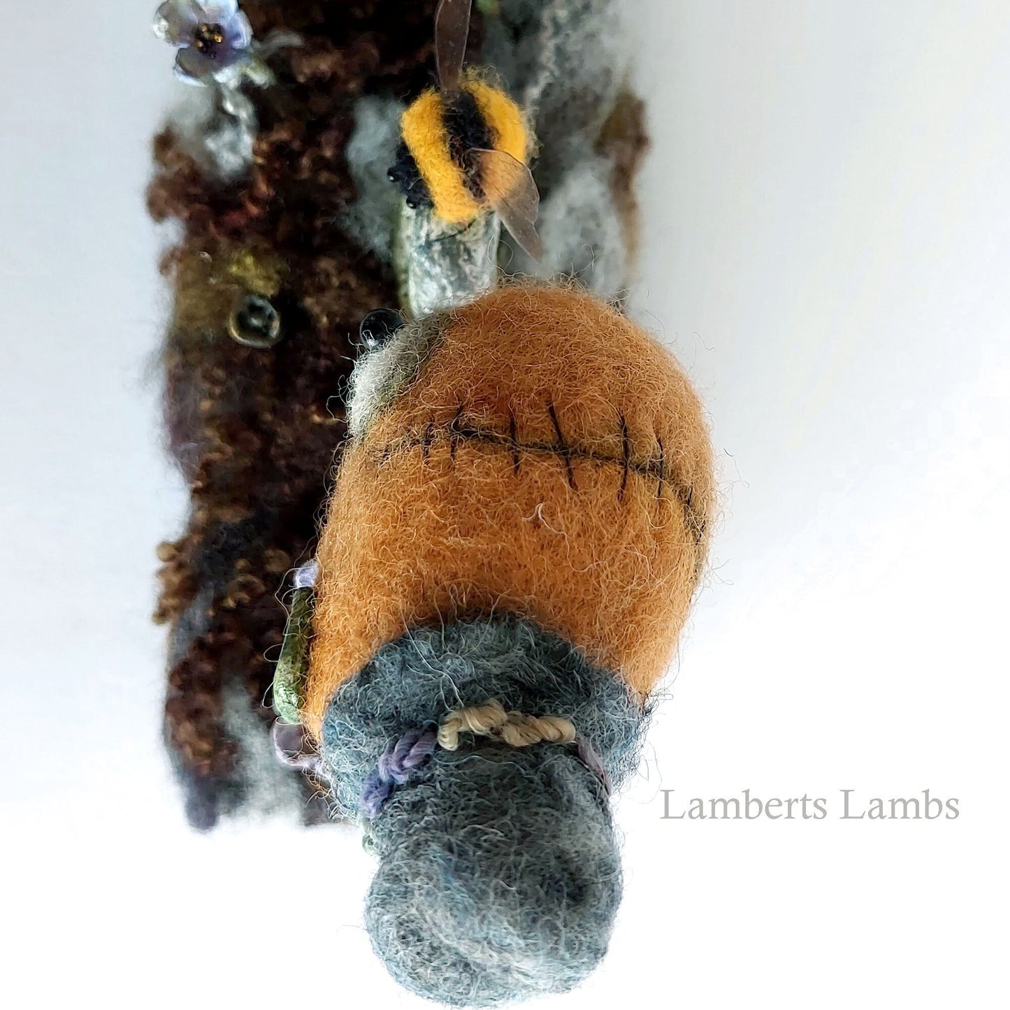 Gingerbread man voodoo doll in a graveyard diorama