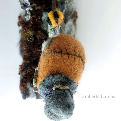 Gingerbread man voodoo doll in a graveyard diorama