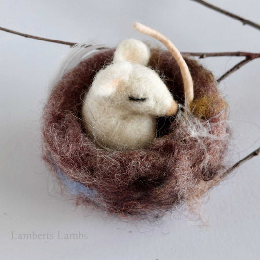 Needle felted baby mouse in a nest