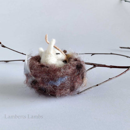 Needle felted baby mouse in a nest
